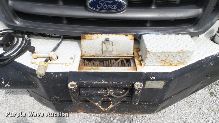 image for item DD7353 2003 Ford F550 Super Duty XL Crew Cab flatbed truck