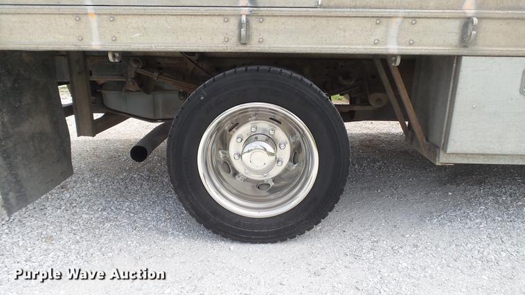 image for item DD7353 2003 Ford F550 Super Duty XL Crew Cab flatbed truck