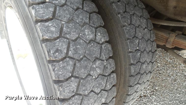 image for item DD7353 2003 Ford F550 Super Duty XL Crew Cab flatbed truck