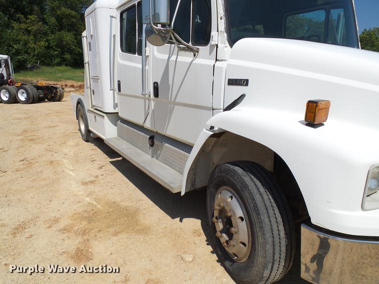 image for item DE5185 2000 Freightliner FL60 Crew Cab flatbed truck