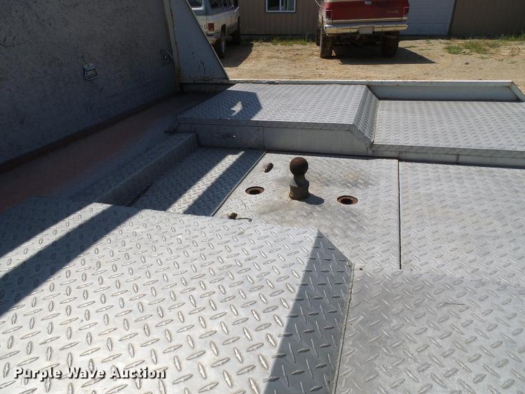 image for item DE5185 2000 Freightliner FL60 Crew Cab flatbed truck