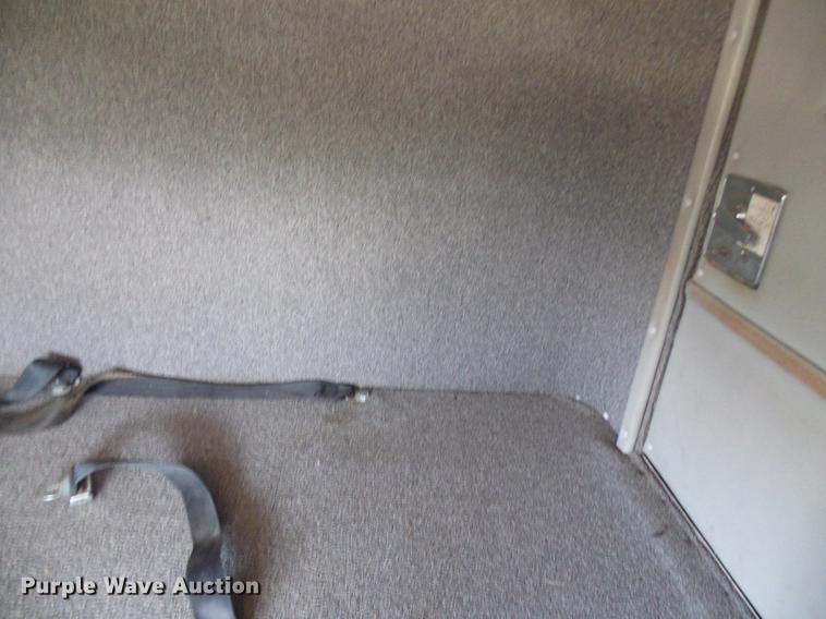 image for item DE5185 2000 Freightliner FL60 Crew Cab flatbed truck