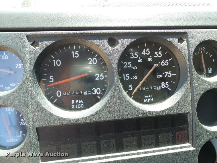 image for item DE5185 2000 Freightliner FL60 Crew Cab flatbed truck