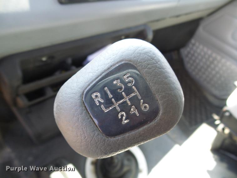 image for item DE5185 2000 Freightliner FL60 Crew Cab flatbed truck