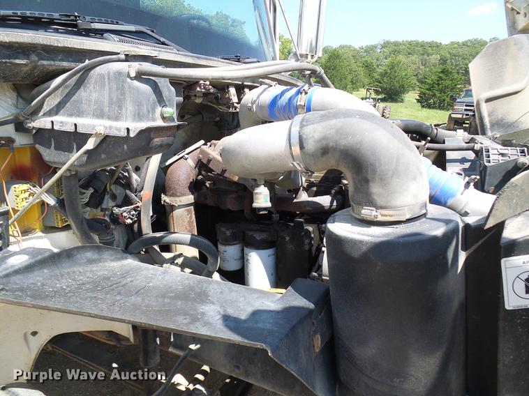 image for item DE5185 2000 Freightliner FL60 Crew Cab flatbed truck