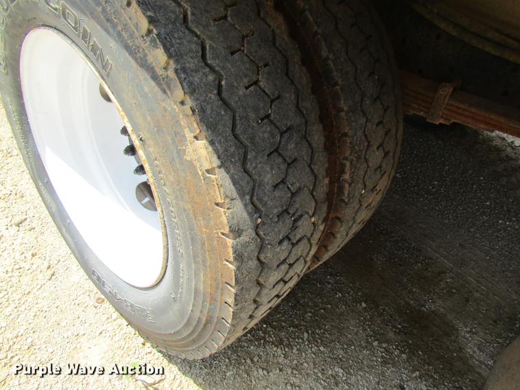 image for item DE5186 1998 International 4700 rollback truck