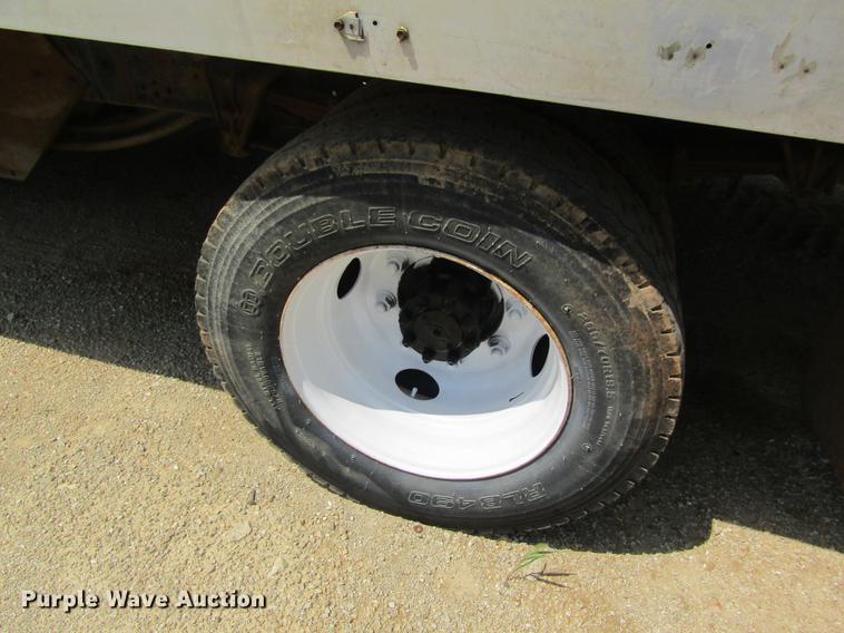 image for item DE5186 1998 International 4700 rollback truck