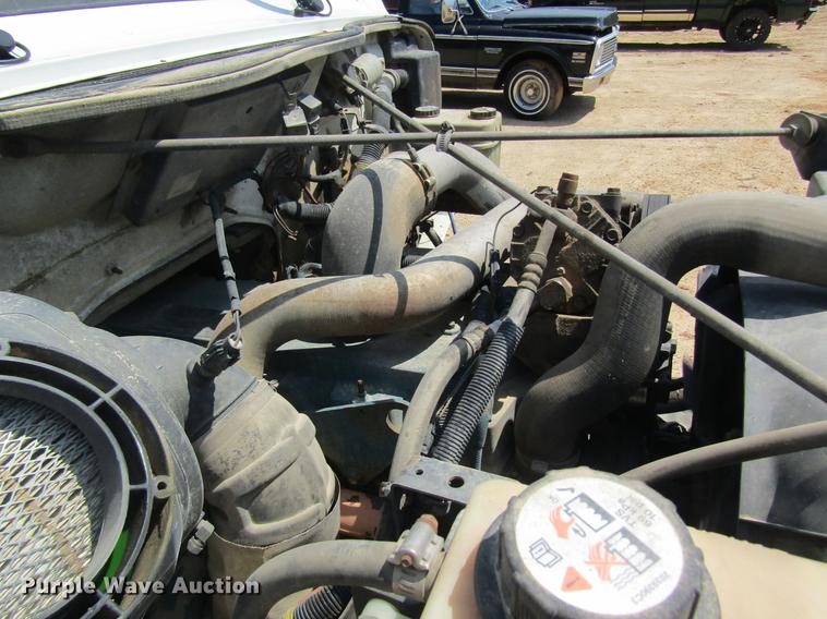 image for item DE5186 1998 International 4700 rollback truck