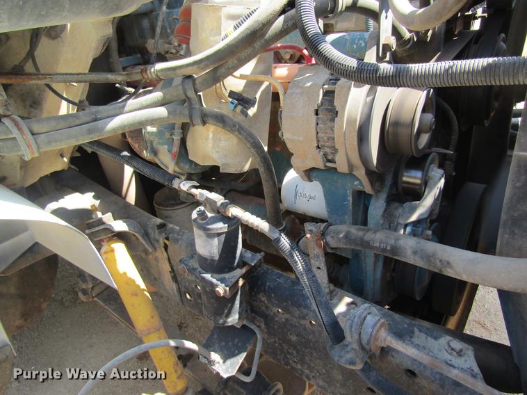 image for item DE5186 1998 International 4700 rollback truck