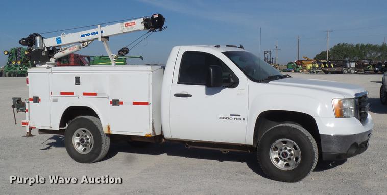 image for item EI9646 2009 GMC Sierra 3500 utility bed pickup truck with crane