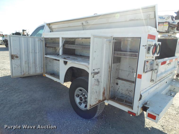 image for item EI9646 2009 GMC Sierra 3500 utility bed pickup truck with crane