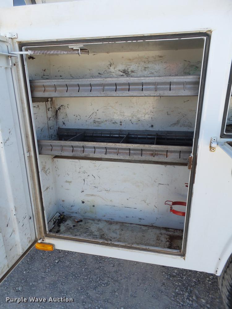 image for item EI9646 2009 GMC Sierra 3500 utility bed pickup truck with crane