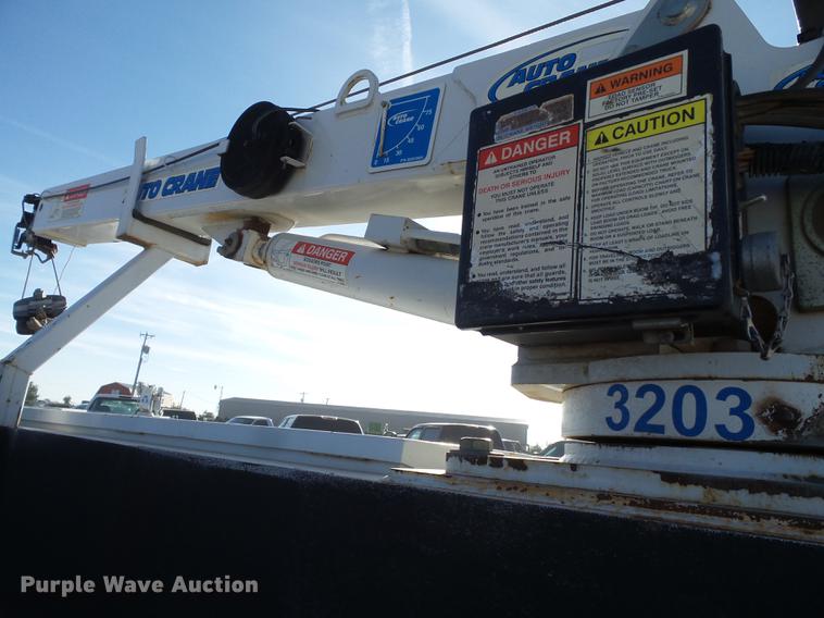 image for item EI9646 2009 GMC Sierra 3500 utility bed pickup truck with crane