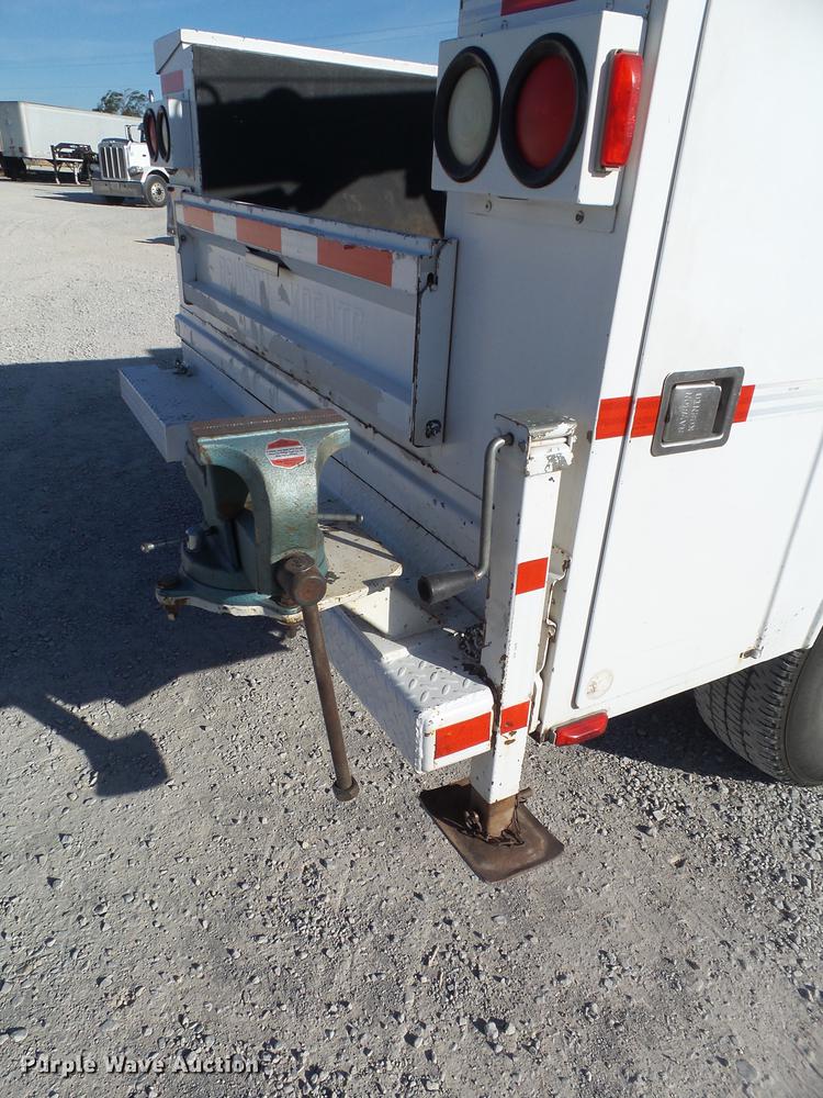 image for item EI9646 2009 GMC Sierra 3500 utility bed pickup truck with crane