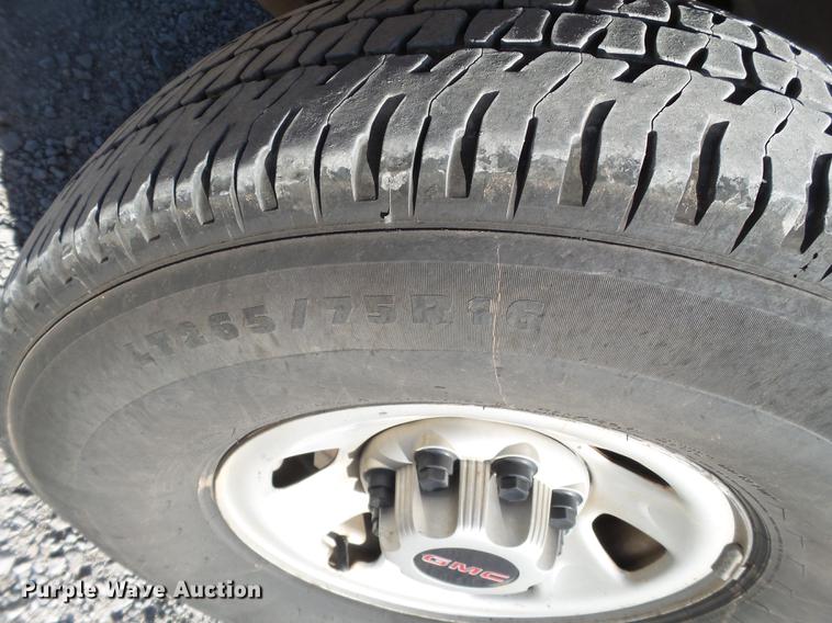 image for item EI9646 2009 GMC Sierra 3500 utility bed pickup truck with crane