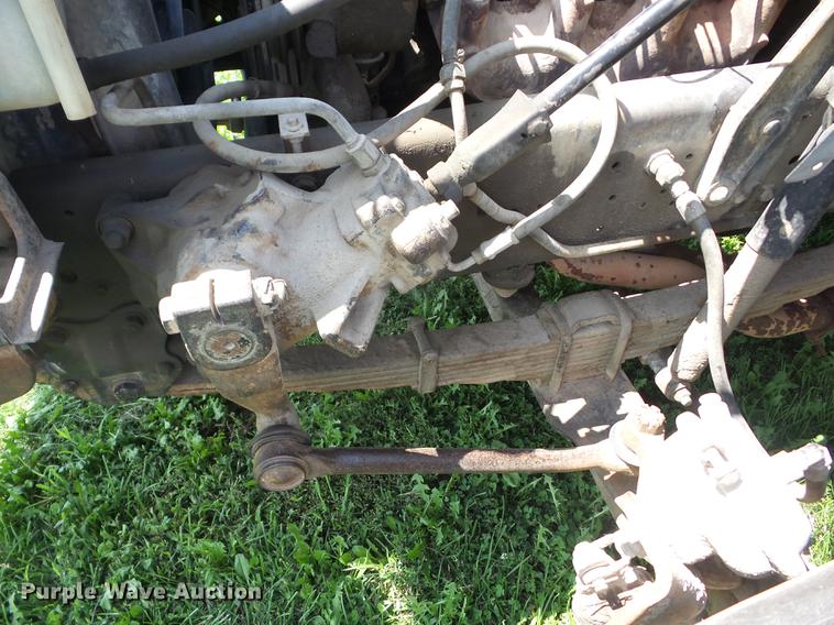 image for item EI9890 1984 Ford F700 flatbed truck