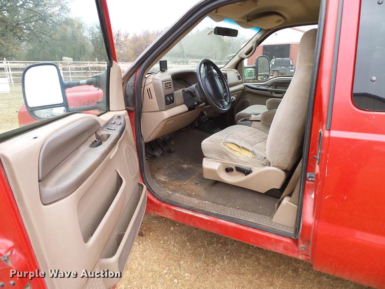 image for item FE9502 1999 Ford F350 Super Duty SuperCab flatbed pickup truck