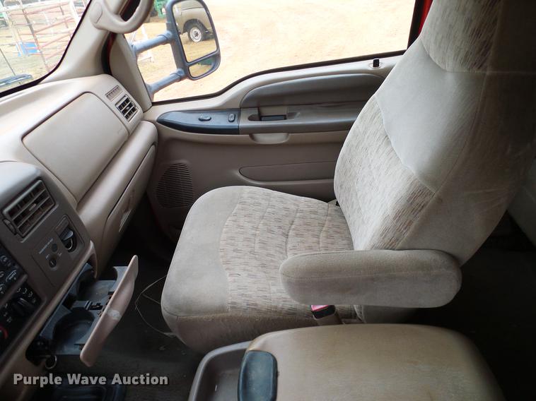 image for item FE9502 1999 Ford F350 Super Duty SuperCab flatbed pickup truck