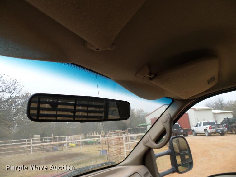 image for item FE9502 1999 Ford F350 Super Duty SuperCab flatbed pickup truck