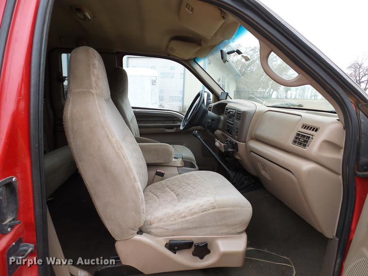 image for item FE9502 1999 Ford F350 Super Duty SuperCab flatbed pickup truck