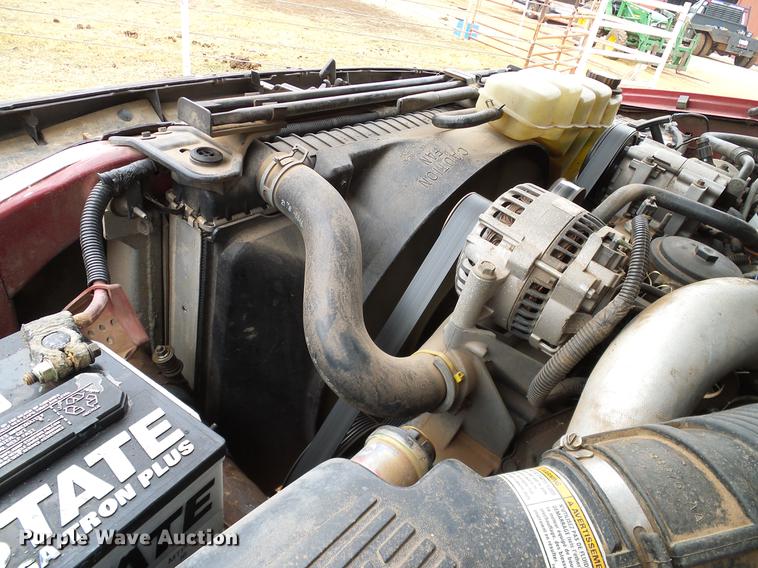 image for item FE9502 1999 Ford F350 Super Duty SuperCab flatbed pickup truck