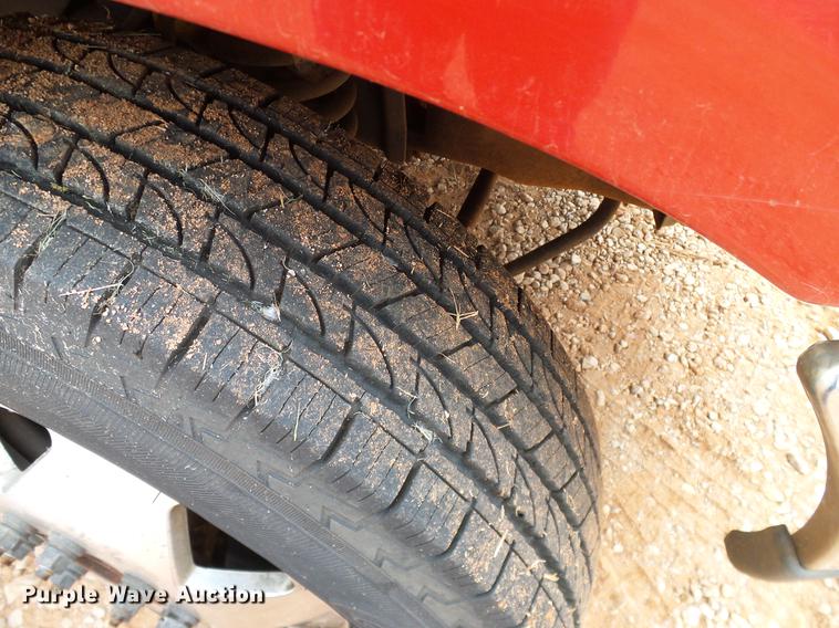 image for item FE9502 1999 Ford F350 Super Duty SuperCab flatbed pickup truck