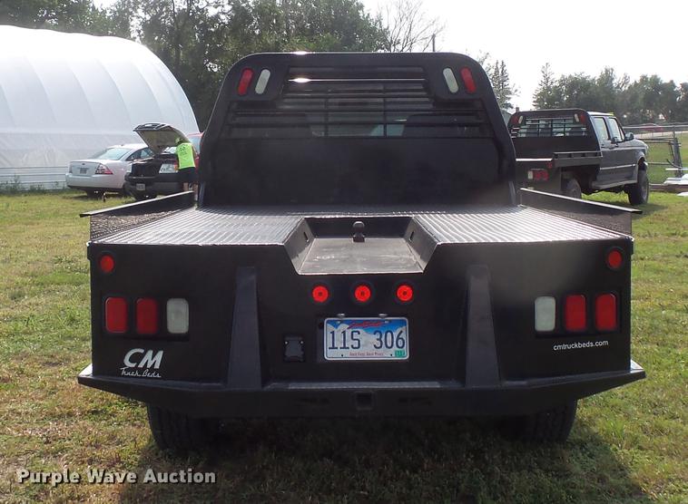 image for item FT9793 2006 Ford F350 Super Duty Crew Cab flatbed pickup truck