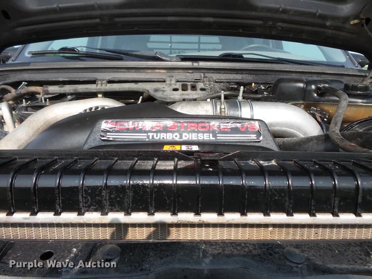 image for item FT9793 2006 Ford F350 Super Duty Crew Cab flatbed pickup truck