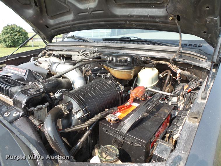 image for item FT9793 2006 Ford F350 Super Duty Crew Cab flatbed pickup truck