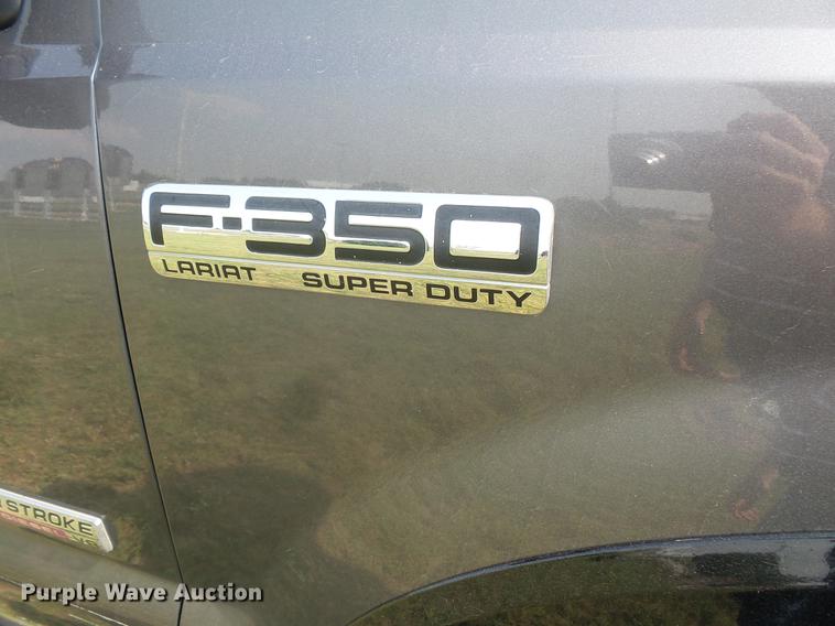 image for item FT9793 2006 Ford F350 Super Duty Crew Cab flatbed pickup truck