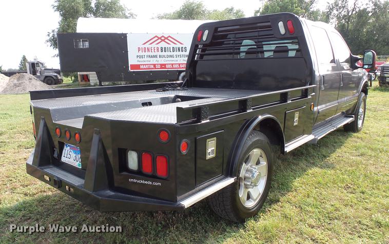 image for item FT9793 2006 Ford F350 Super Duty Crew Cab flatbed pickup truck