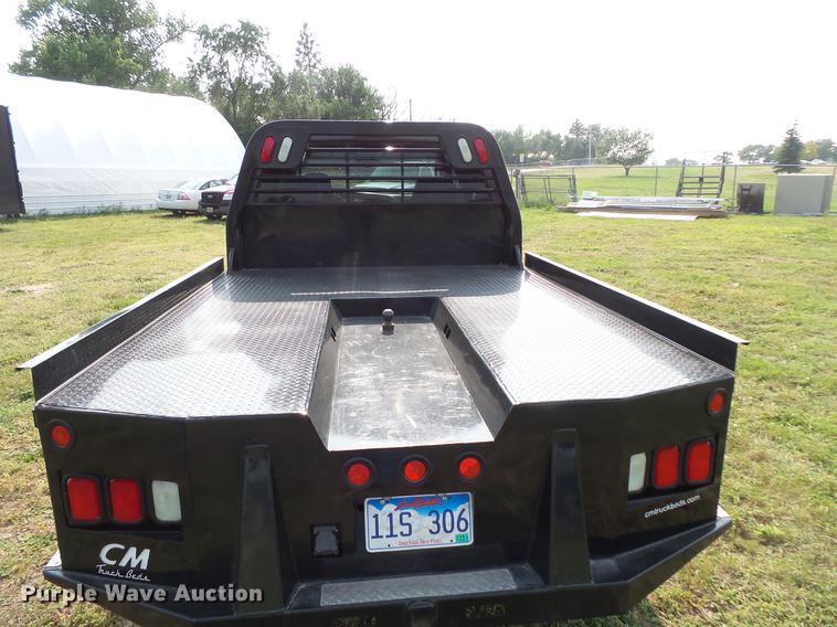 image for item FT9793 2006 Ford F350 Super Duty Crew Cab flatbed pickup truck