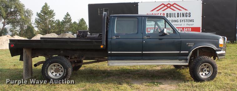 image for item FT9795 1995 Ford F350 Super Duty Crew Cab flatbed pickup truck