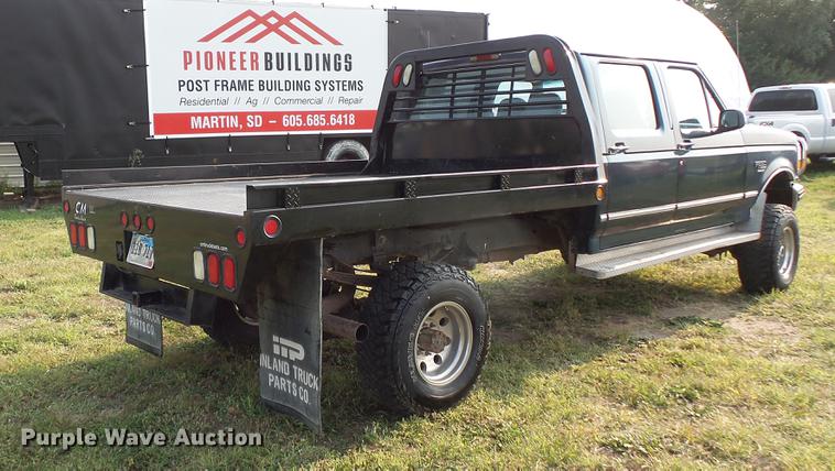 image for item FT9795 1995 Ford F350 Super Duty Crew Cab flatbed pickup truck