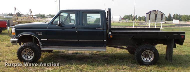image for item FT9795 1995 Ford F350 Super Duty Crew Cab flatbed pickup truck