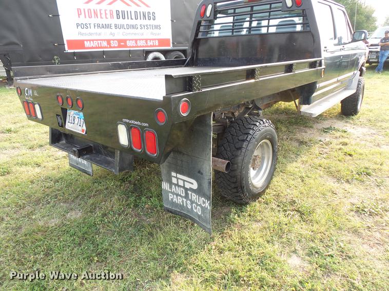 image for item FT9795 1995 Ford F350 Super Duty Crew Cab flatbed pickup truck