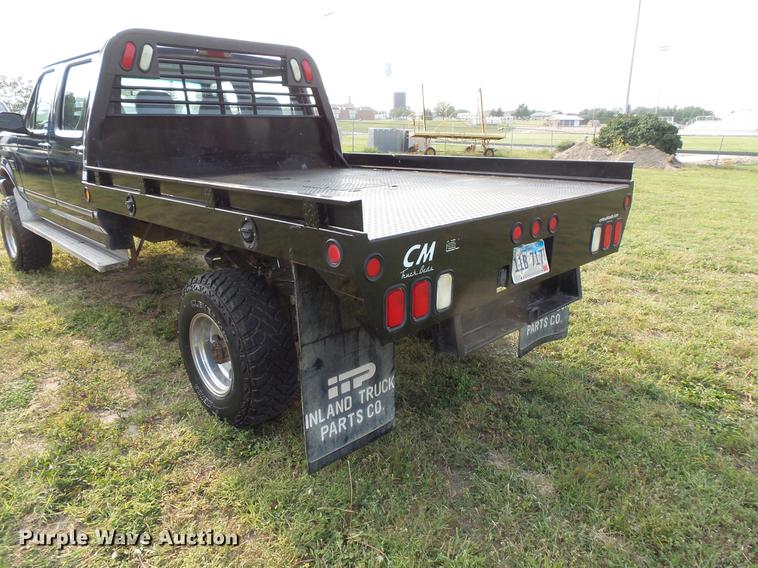 image for item FT9795 1995 Ford F350 Super Duty Crew Cab flatbed pickup truck