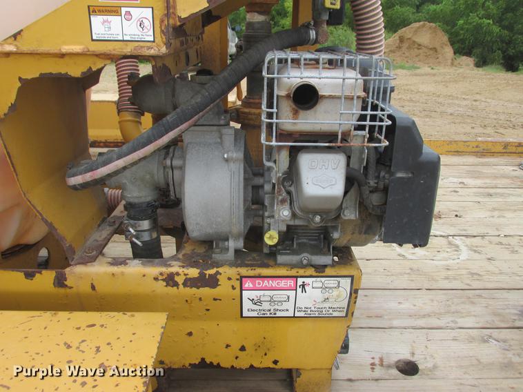 image for item DA8266 2001 Vermeer ST300 mud mixer and Belshe trailer