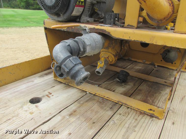 image for item DA8266 2001 Vermeer ST300 mud mixer and Belshe trailer