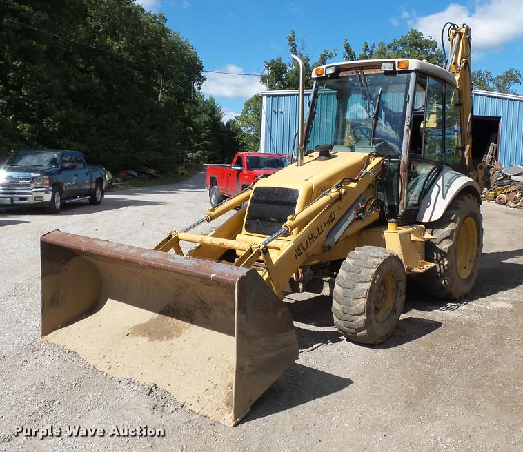 image for item DB7048 1999 New Holland 675E backhoe