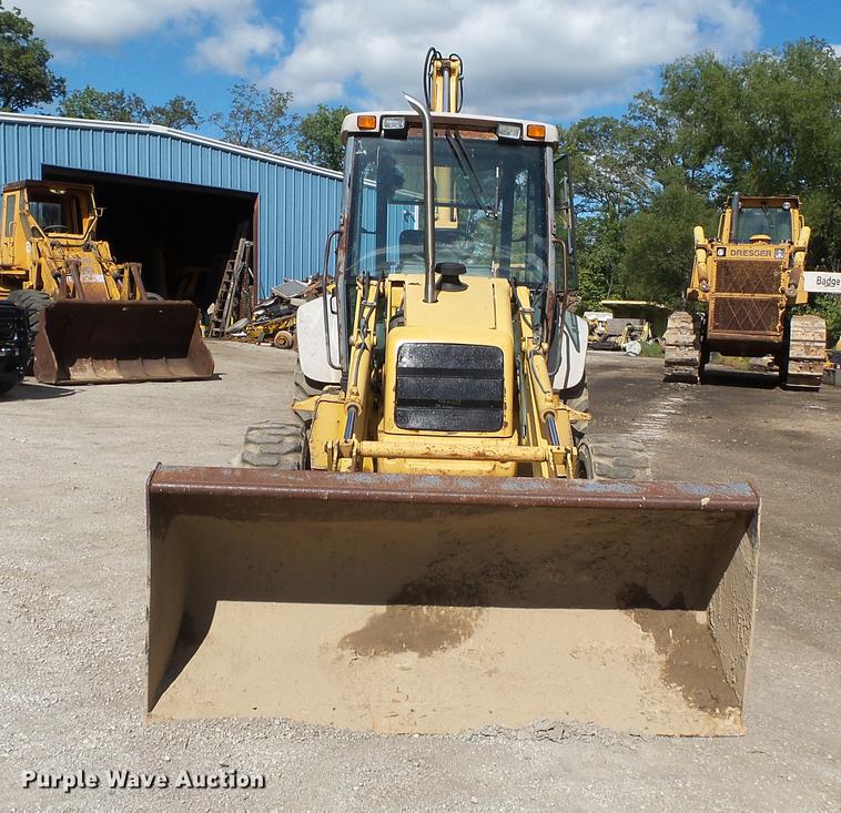 image for item DB7048 1999 New Holland 675E backhoe