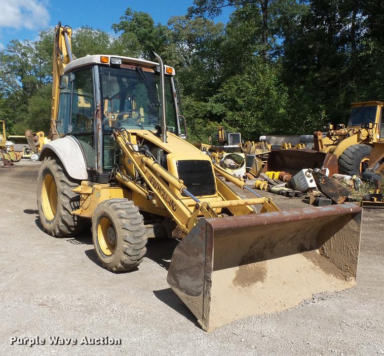 image for item DB7048 1999 New Holland 675E backhoe