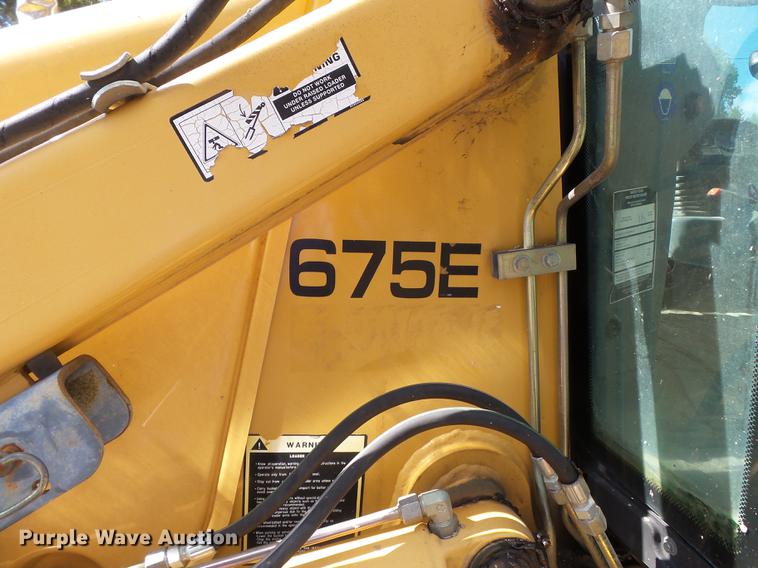 image for item DB7048 1999 New Holland 675E backhoe