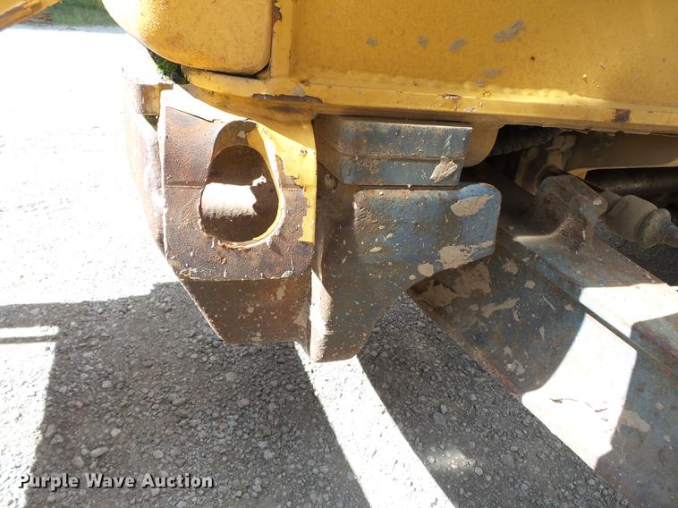 image for item DB7048 1999 New Holland 675E backhoe