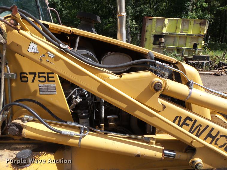 image for item DB7048 1999 New Holland 675E backhoe