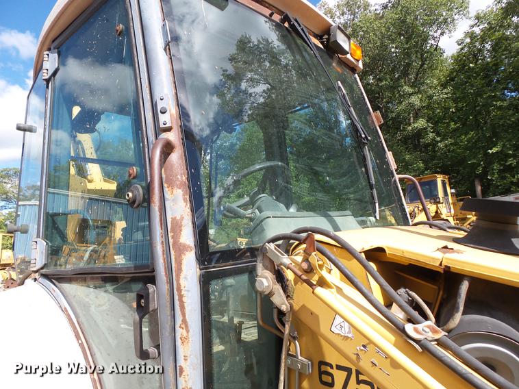 image for item DB7048 1999 New Holland 675E backhoe