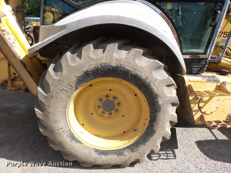 image for item DB7048 1999 New Holland 675E backhoe