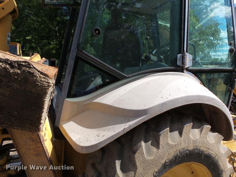 image for item DB7048 1999 New Holland 675E backhoe