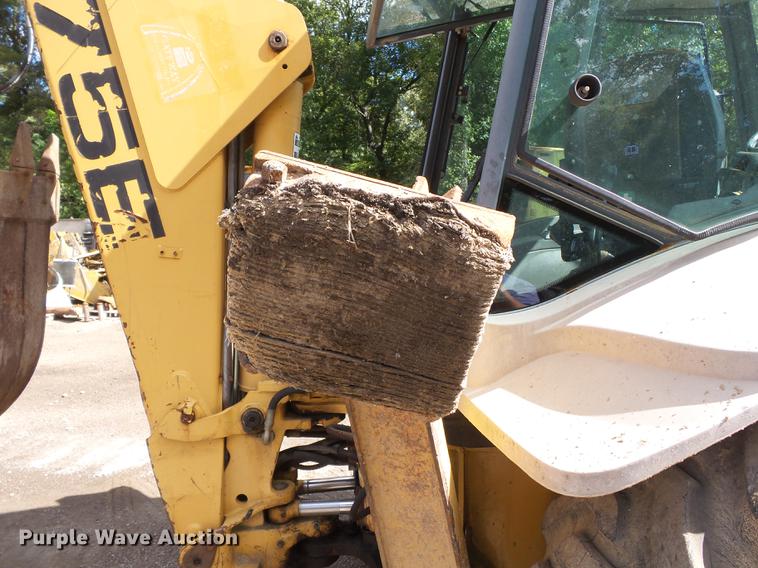 image for item DB7048 1999 New Holland 675E backhoe