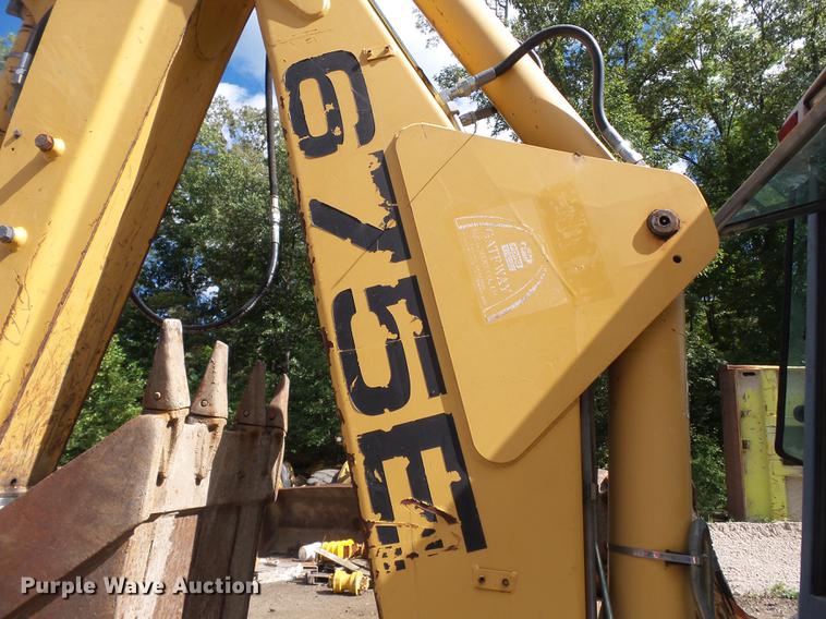 image for item DB7048 1999 New Holland 675E backhoe